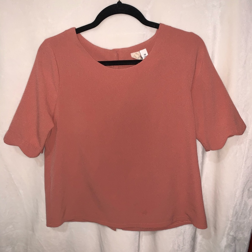 Blouse with buttons detail on the back